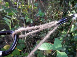 8 rope from string pull a loop of the twisted twine through the Karabiner.JPG