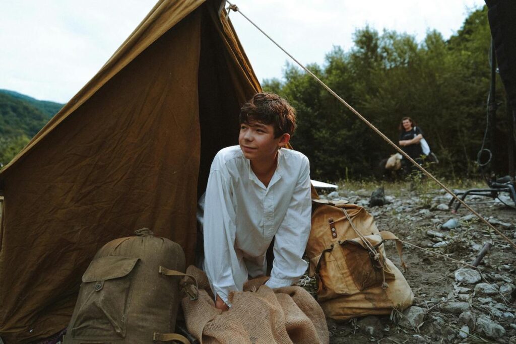 youth in tent